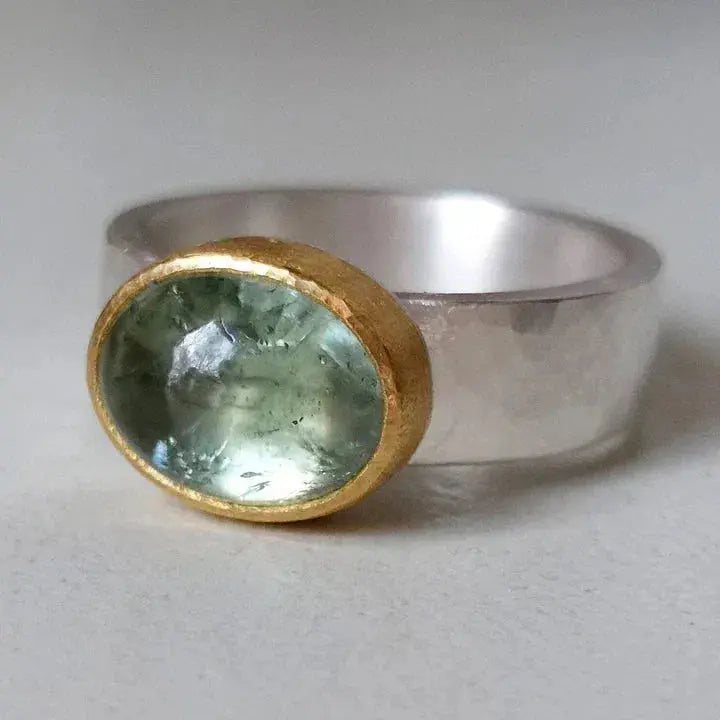 Green ring with rounded stone